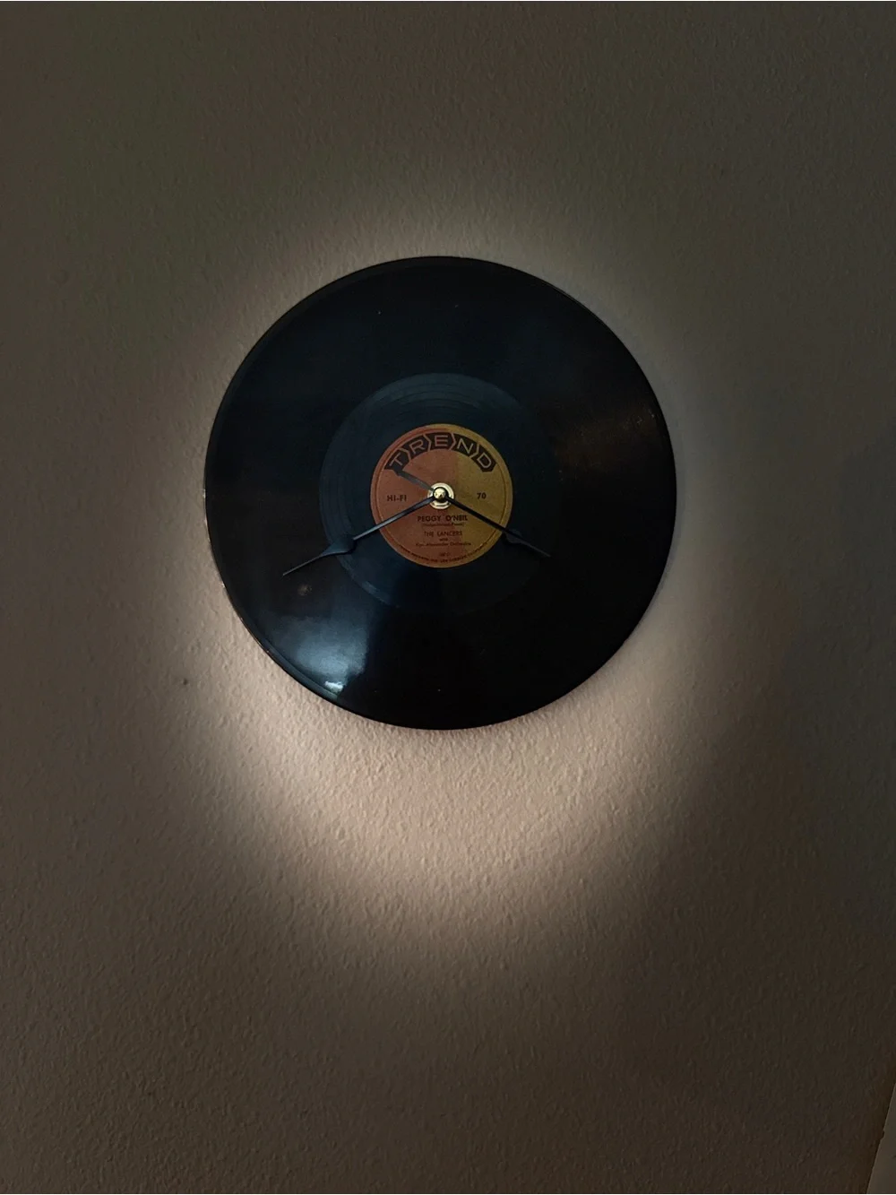 Retro Vinyl Record Wall Clock in Black with Yellow Label